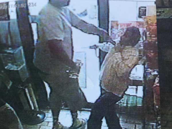 Surveillance photo of strong-arm robbery in Ferguson